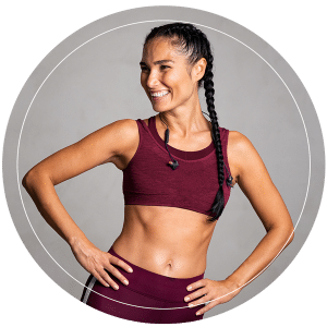 A happy young woman preparing for a workout
