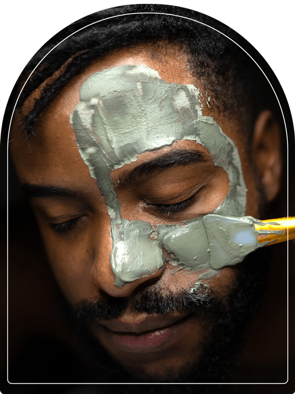 Applying a chemical peel to a man's face
