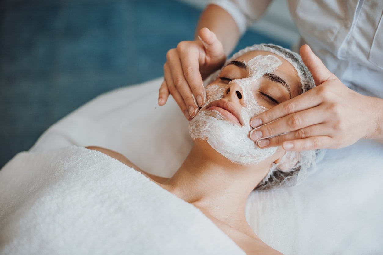 Close-up image of a woman receiving a medical-grade facial