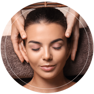 Young Woman Receiving A Head Massage